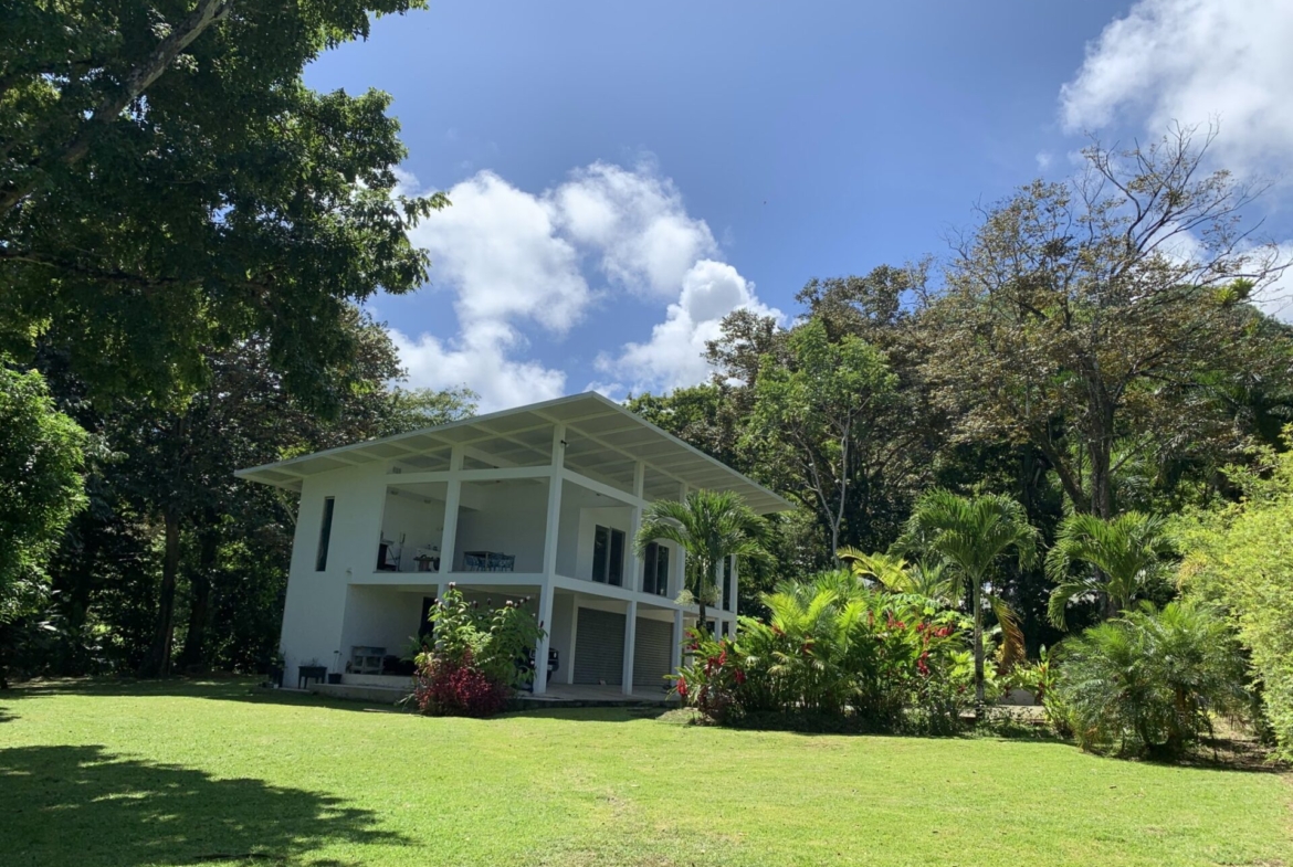 beautiful-pavones-home-with-large-lot-walking-distance-to-beach